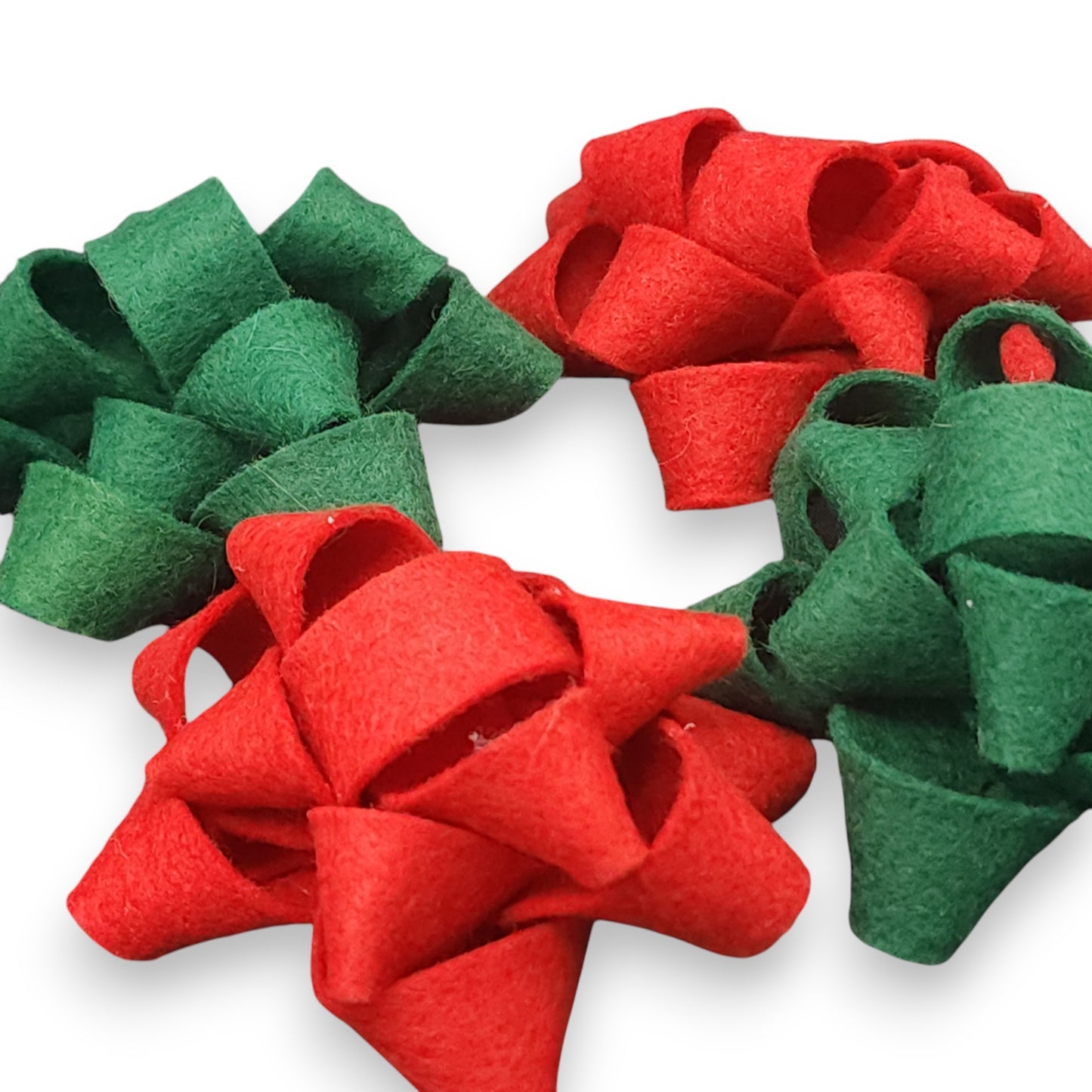 Handcrafted felt gift bows in vibrant colors, perfect for unique gift wrapping and creative crafts.