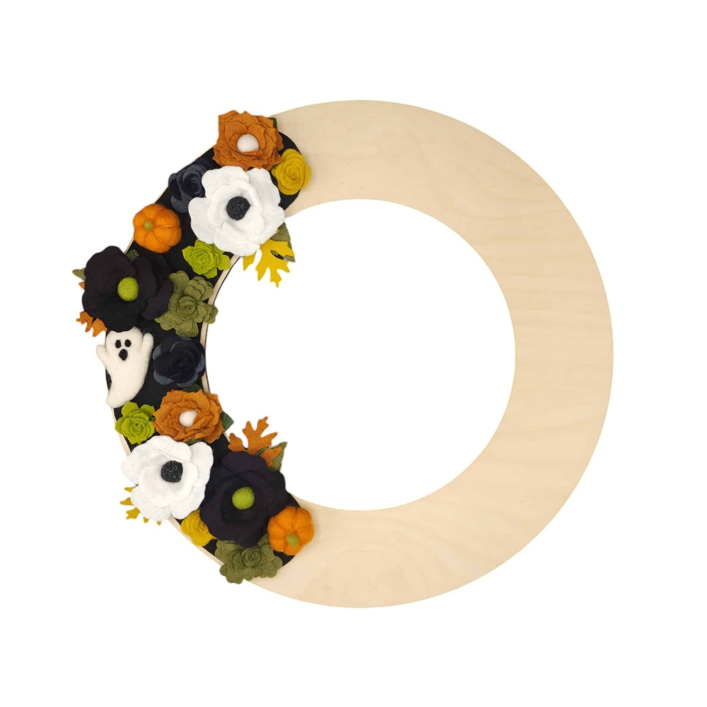 The Halloween holiday arrangement is set on a natural Balic birch base, emphasizing eco-friendly craftsmanship.