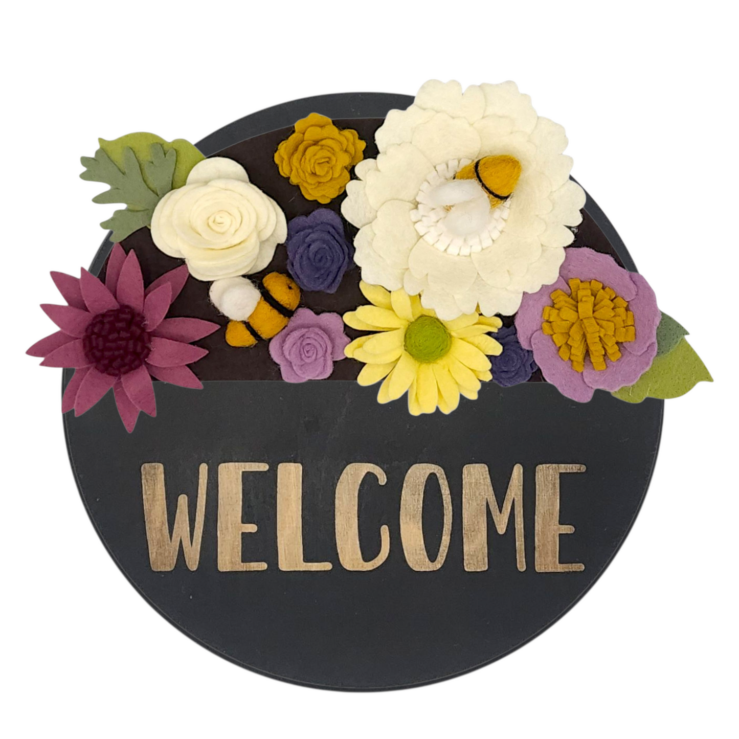 Wreath featuring felt bumblebees and flowers aiding pollinator protection on a round black base reading "WELCOME".