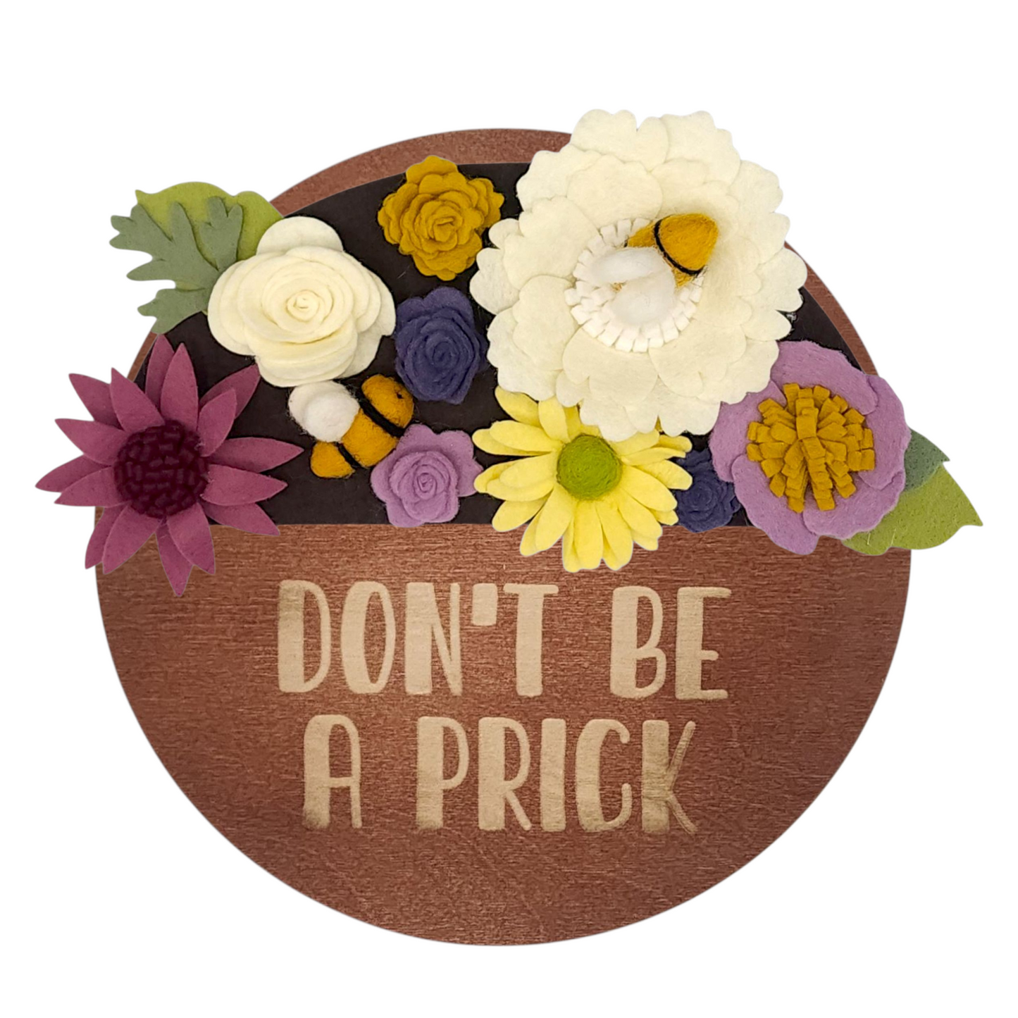 Wreath featuring felt bumblebees and flowers aiding pollinator protection on a round walnut base reading "DON'T BE A PRICK".