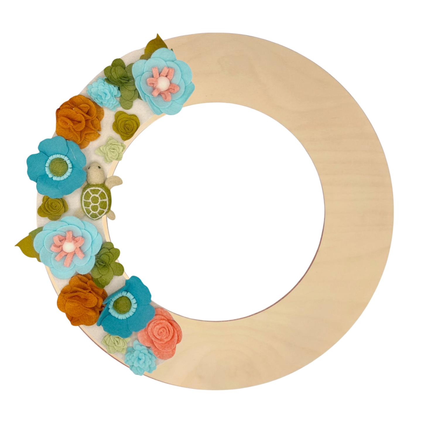 An eco-friendly wreath supporting the "Save the Sea Turtles" cause, featuring bright teal, blue, green, and orange felt flowers on a tan background featured on the birch wreath base.