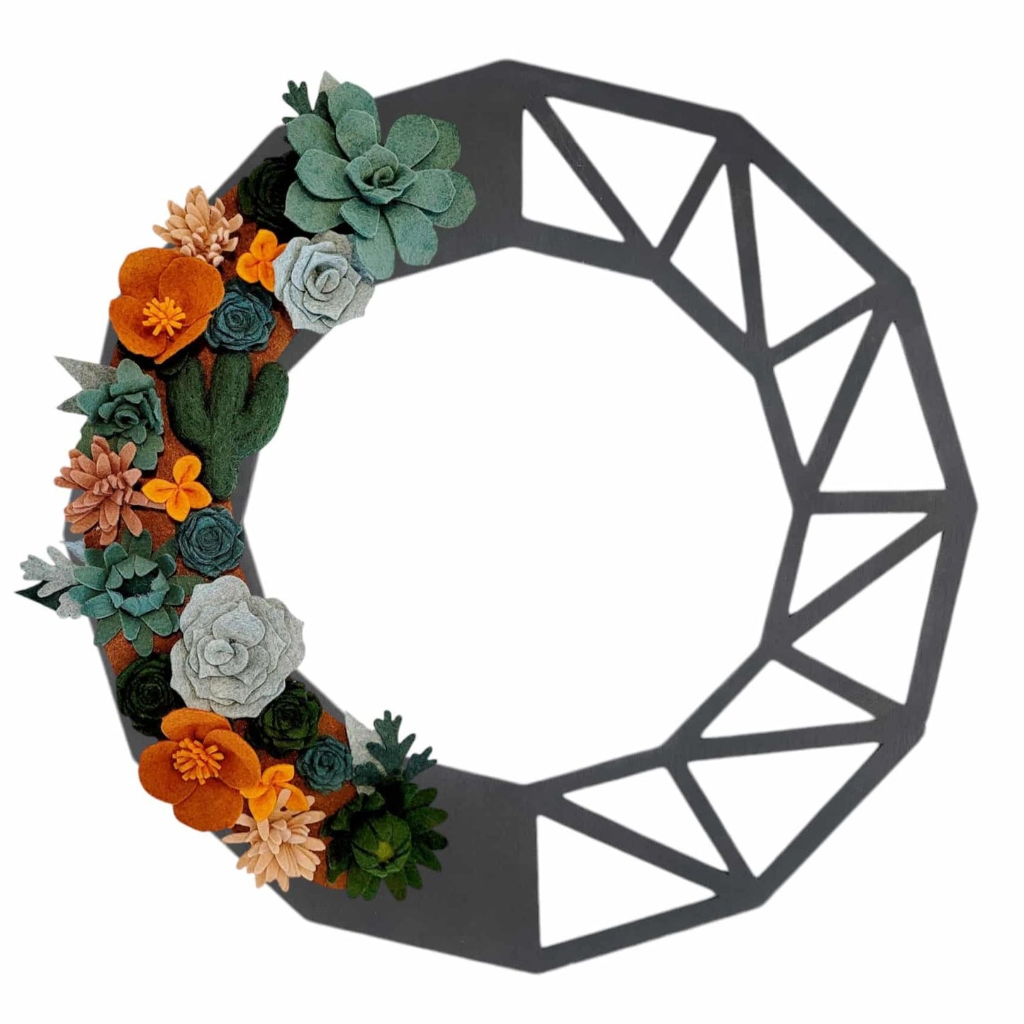 A vibrant wreath with felt cacti, wildflower blooms, and dried grasses on a black geometric wreath base, capturing Arizona's desert charm.