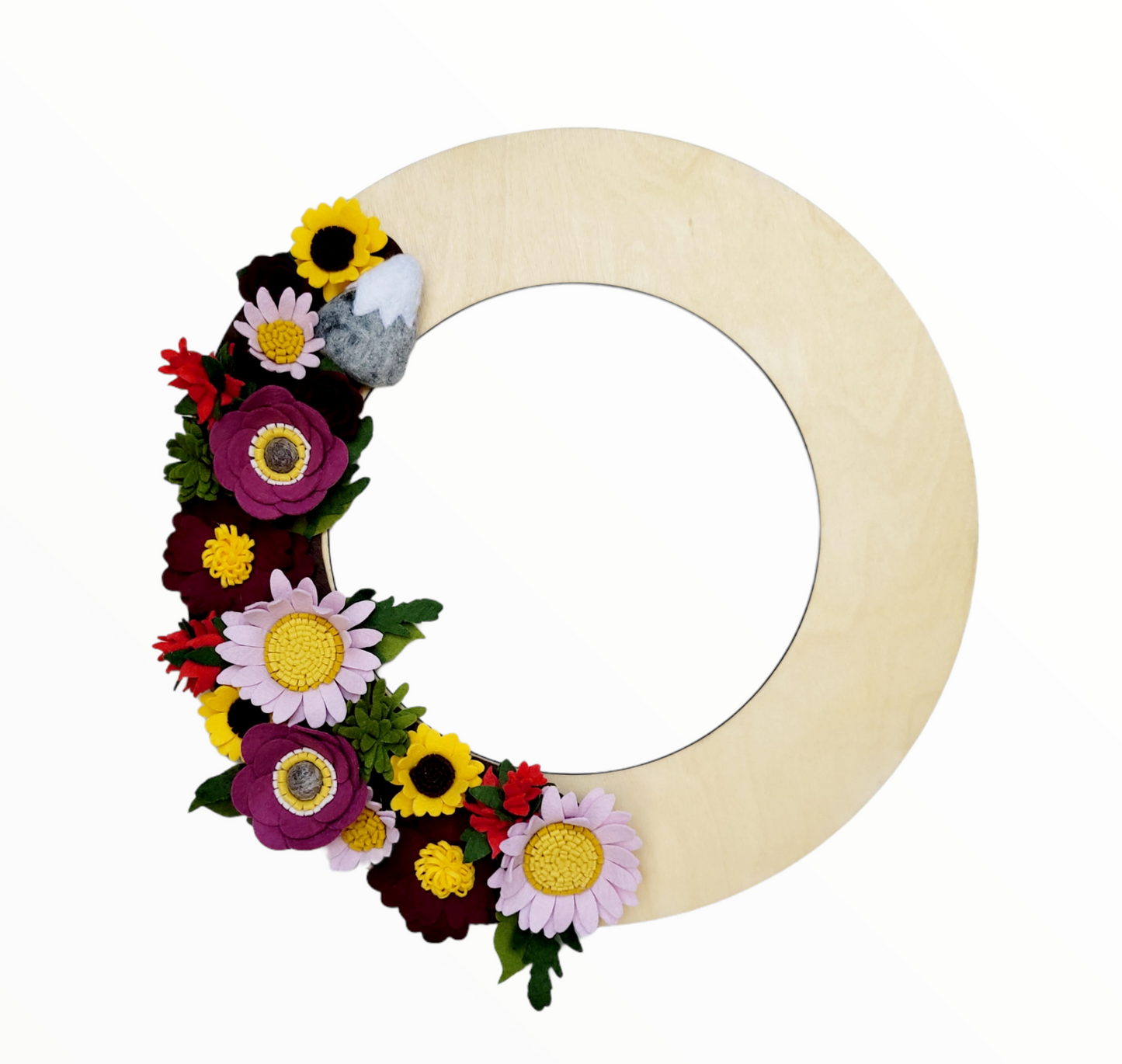 The wreath captures the essence of Washington’s beauty, making it a perfect decorative piece for any door.