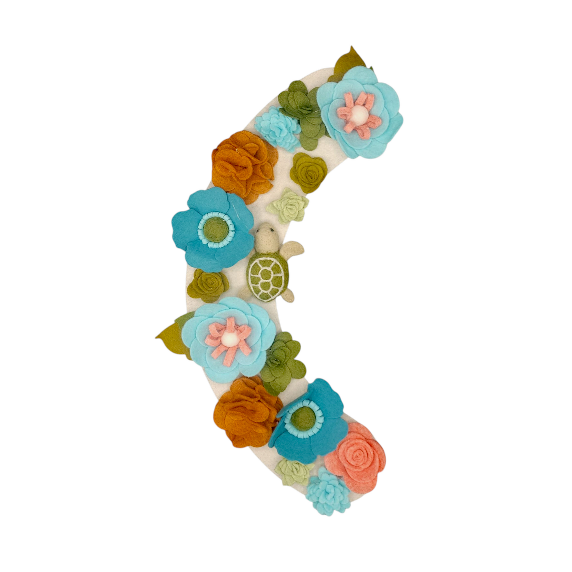 With vibrant teal, green, brown felt flowers and felted sea turtle are evoking a coastal vibe and symbolizing ocean habitats.