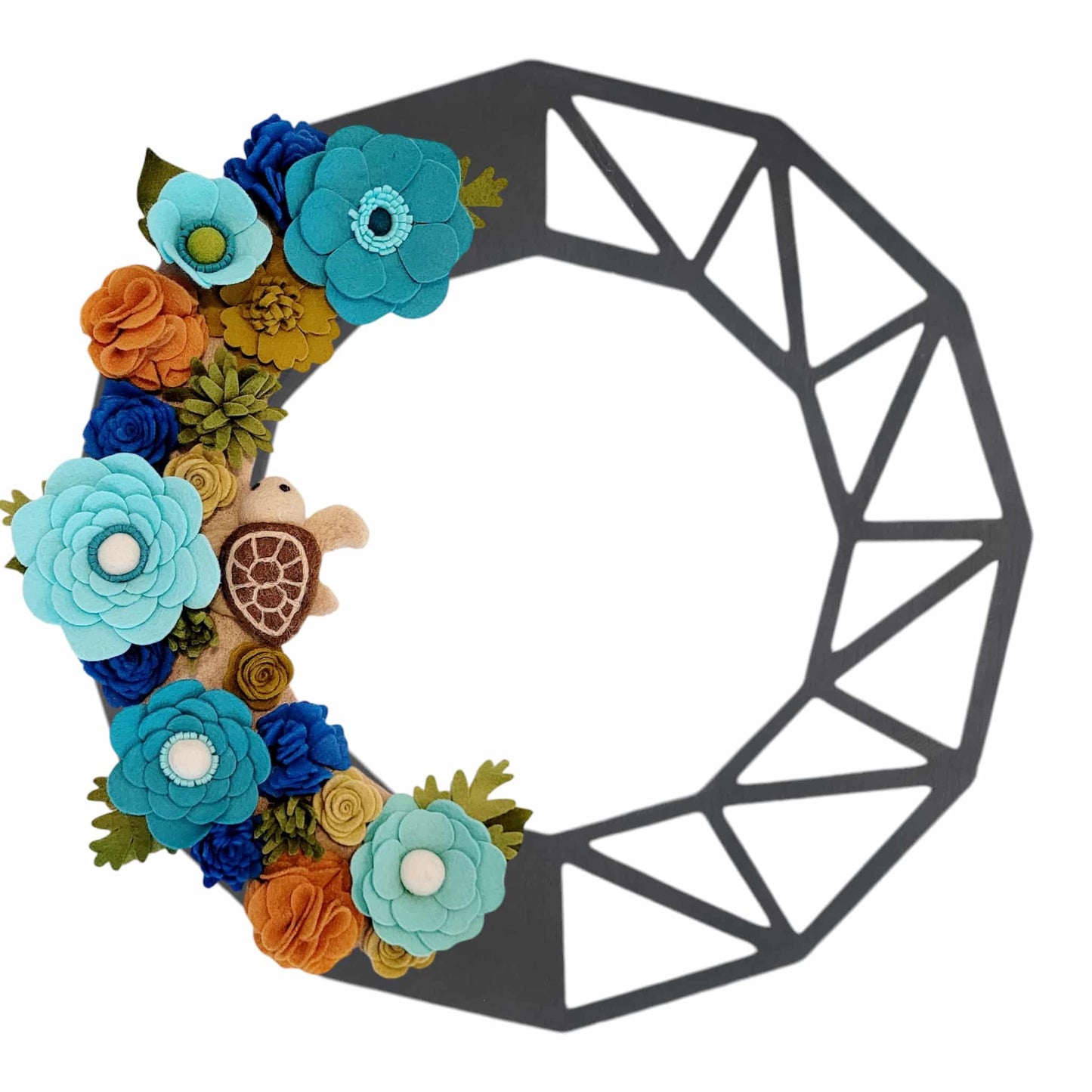 This wreath beautifies your door while raising awareness for the protection of sea turtles and their environment. Shown on the black geometric wreath base.