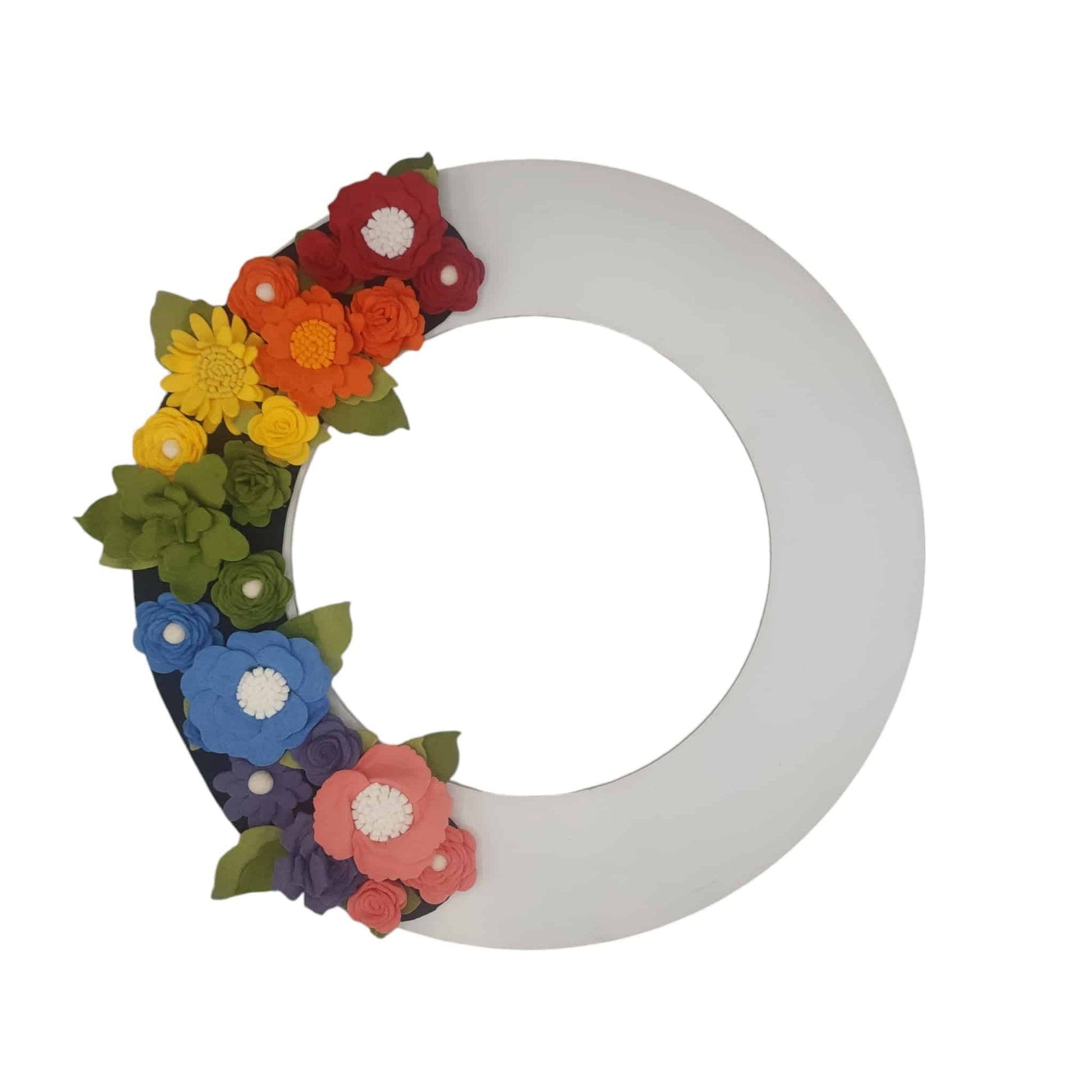 A vibrant white wreath featuring flowers in a rainbow array of colors, celebrating LGBTQ+ pride and love.