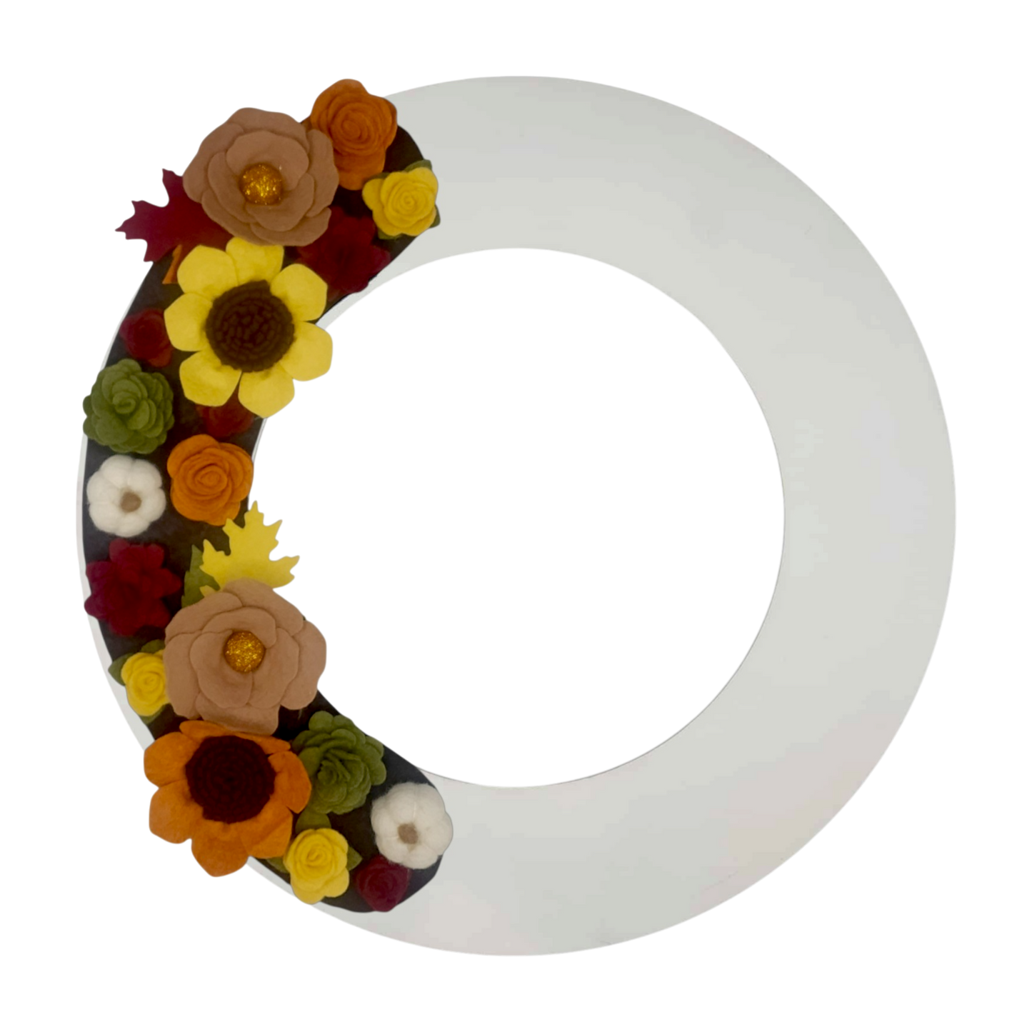 Sunflowers, pumpkins, and assorted autumn-hued flowers on a white wreath base giving a crisp clean look for fall.