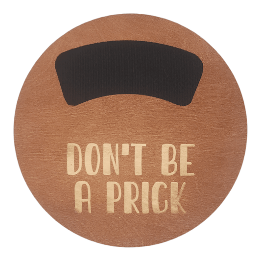 11" circular wreath base in color walnut with "DON'T BE  A PRICK" laser etched below velcro for attachments.