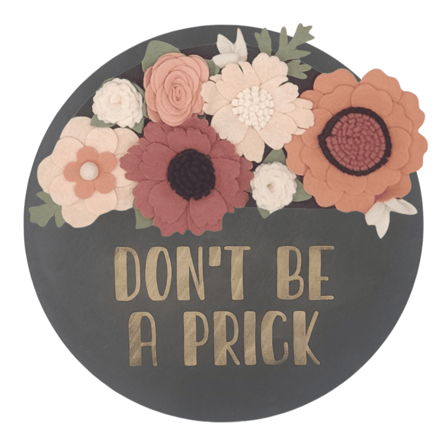 Spring wreath featuring felt flowers in variation of pink and white on a round black base reading "DON'T BE A PRICK".