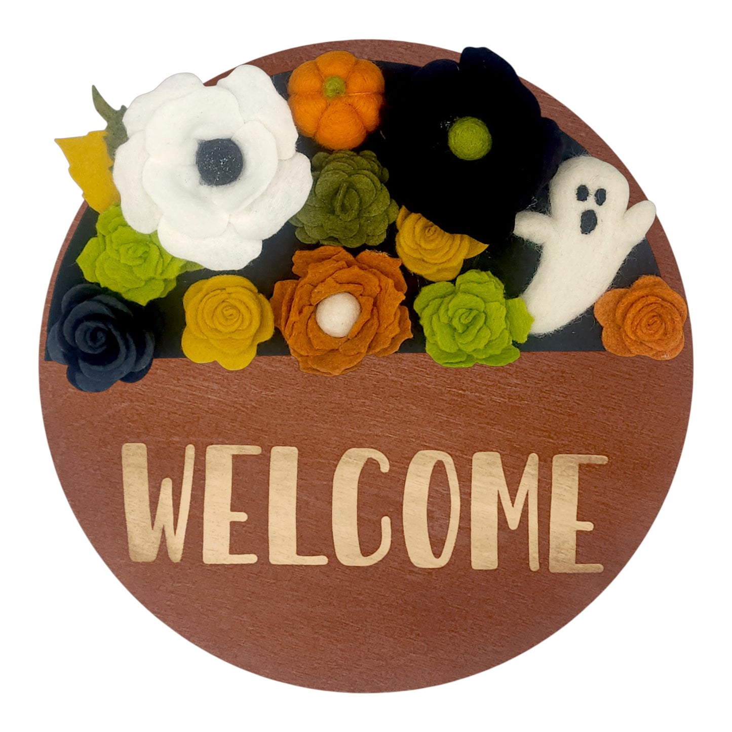 Wreath attachment featuring a smiling felted ghost surrounded by layered green leaves and bright orange florals on a neutral base.