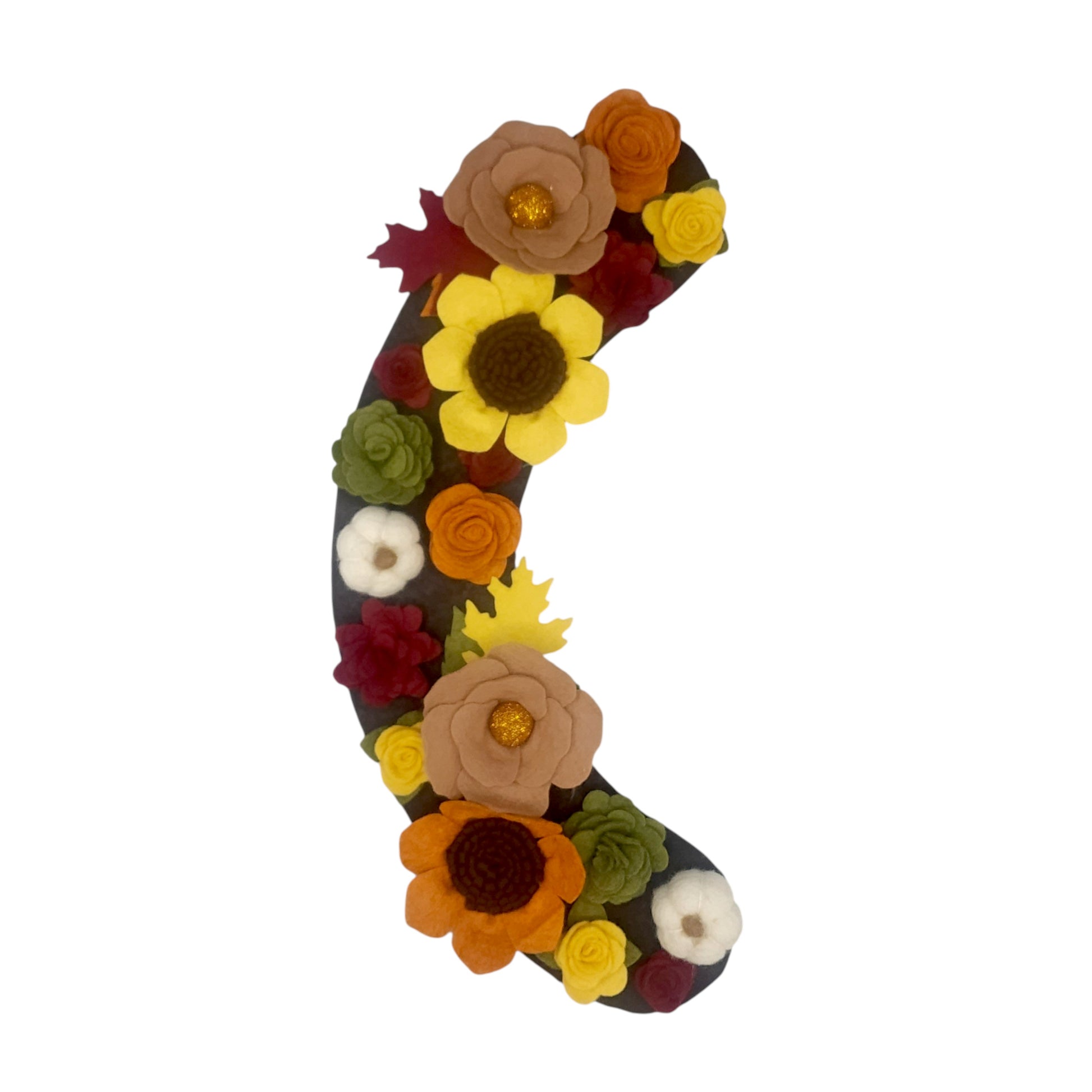 The Autumn wreath attachment is covered in sunflowers, pumpkins, and other autumn-colored flowers on a brown background. 