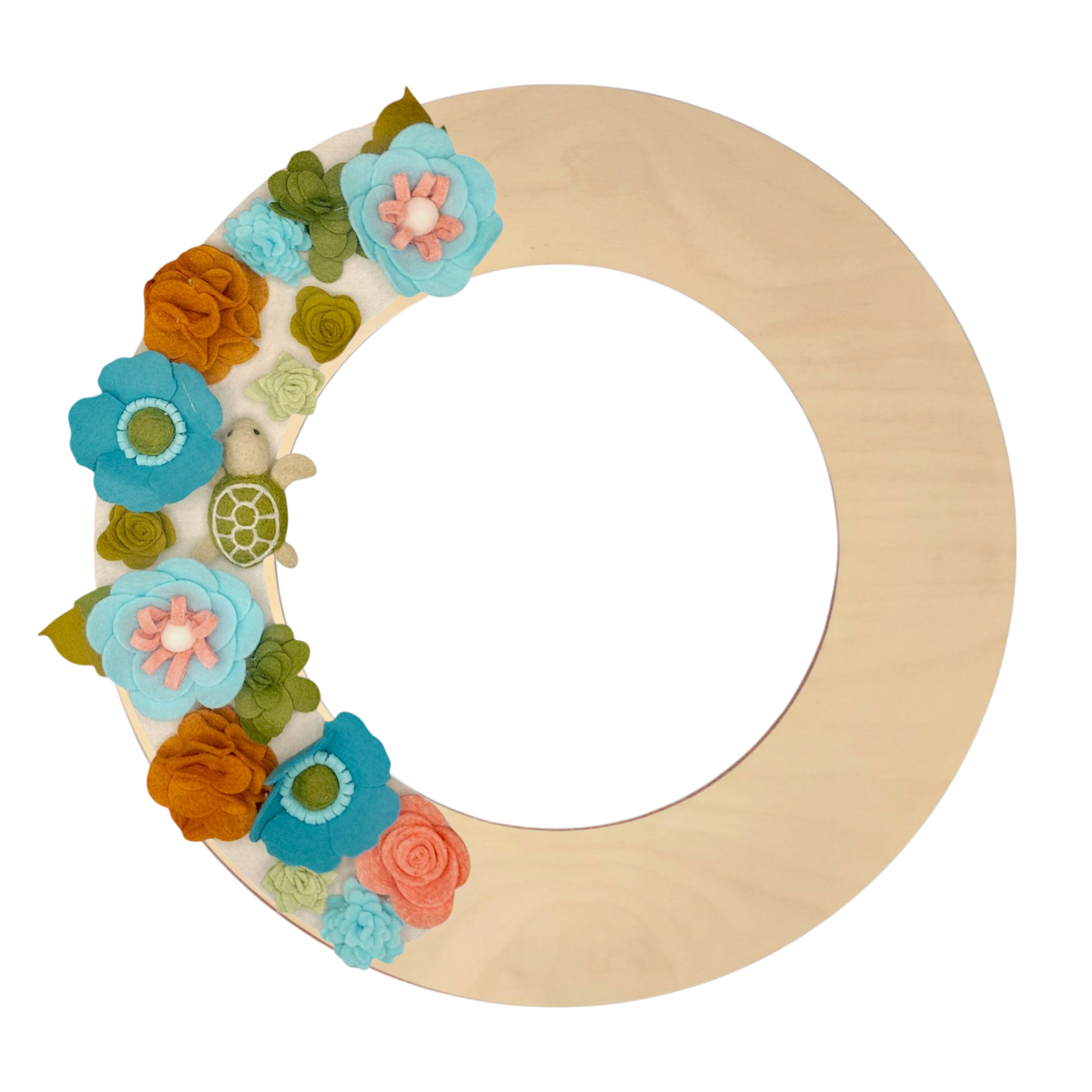 An eco-friendly wreath supporting the "Save the Sea Turtles" cause, featuring bright teal, blue, green, and orange felt flowers on a tan background featured on the birch wreath base.