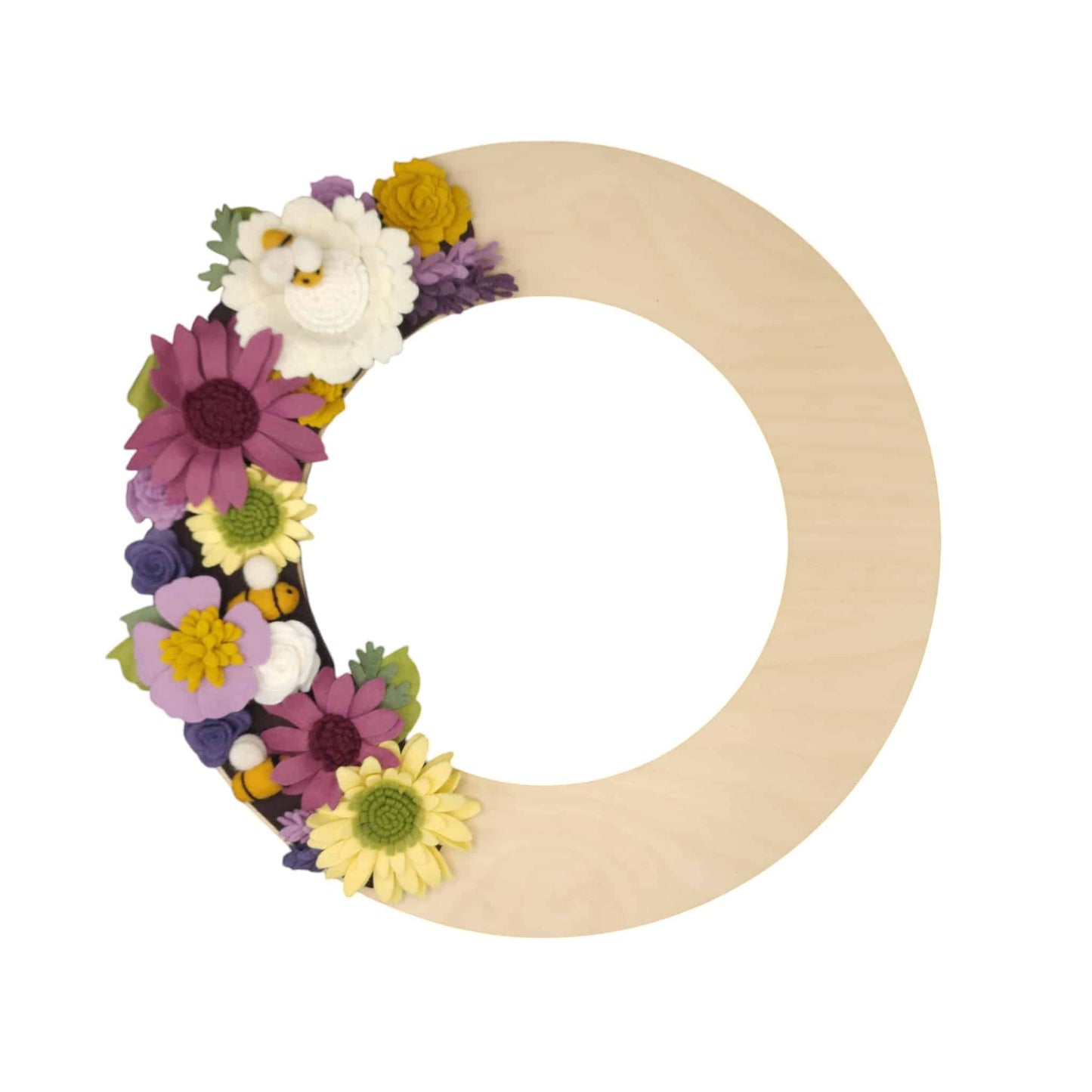 An eco-friendly birch wreath featuring felt bees among vibrant purple and yellow flowers, promoting the "Save the Bees" movement.