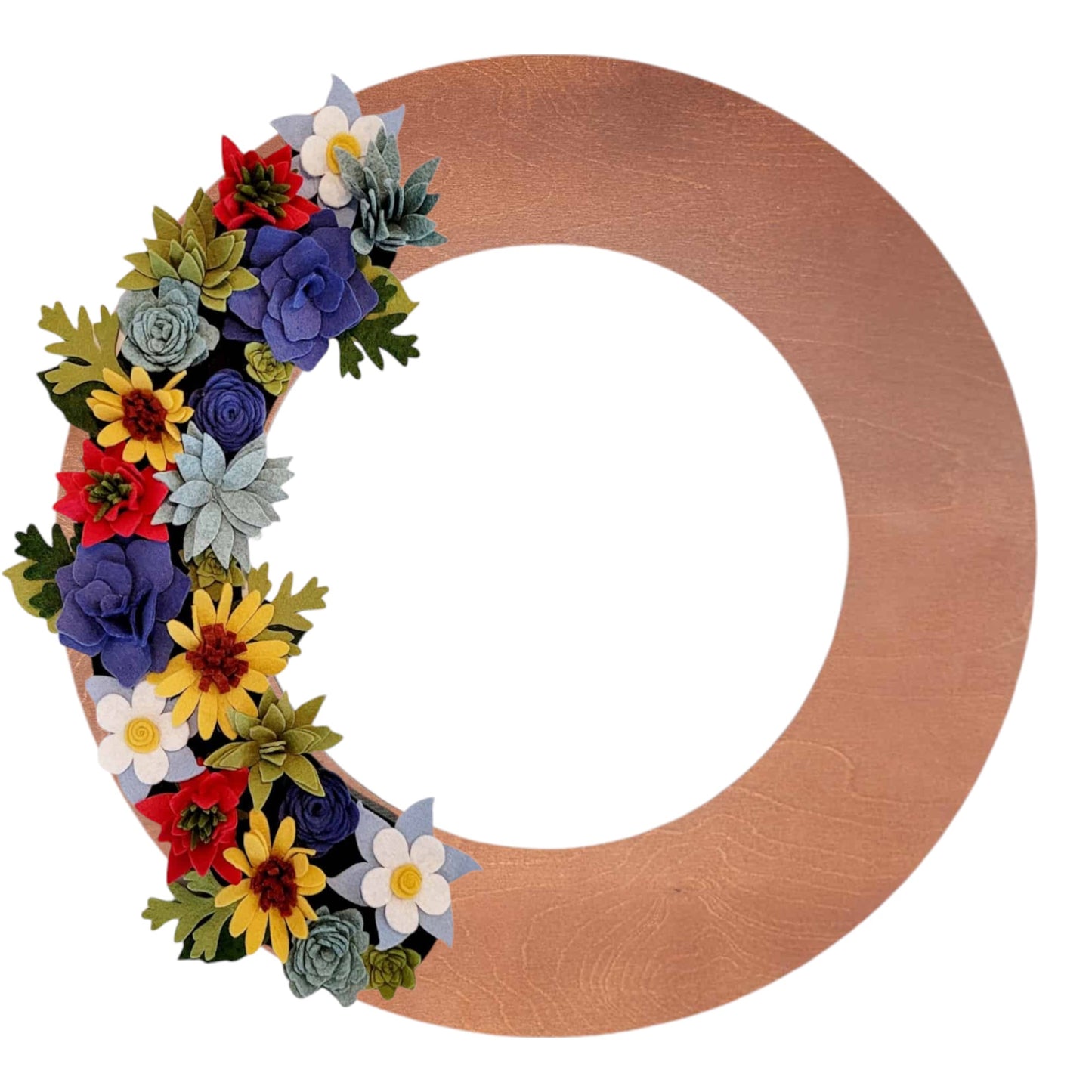 An array of Colorado wildflowers, such as blue columbines, bright sunflowers, and delicate asters, arranged on a walnut wreath base.